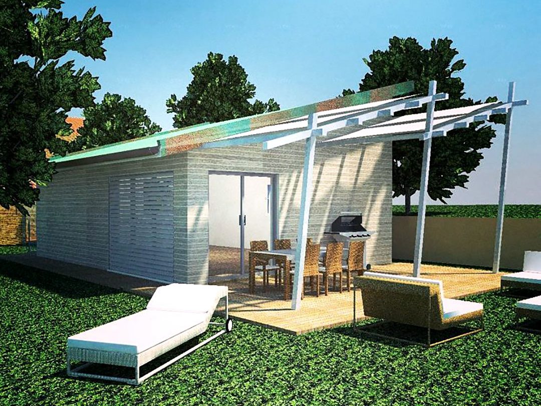 Wooden Houses_Dependance_Struttura in legno dall’aspetto contemporaneo affiancata a un edificio in mattoni preesistente